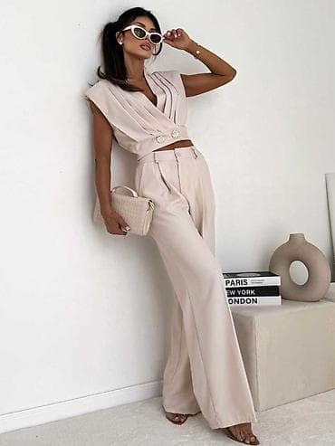 Lične stvari: 🔥Ženski elegantni komplet – prsluk crop i široke pantalone
✅3200 din — 6