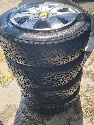 felne ili kapna: Gume M+S cetrnestice 175 65 r 14 sq celicnim felnama i ratkapnama — 3