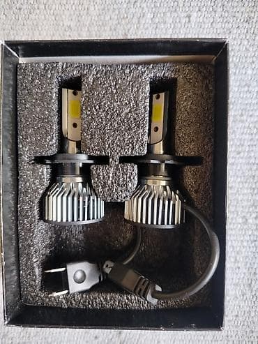 kupujem razno: Na slici se nalazi set H7 LED sijalica za auto farove (kratka ili duga — 1