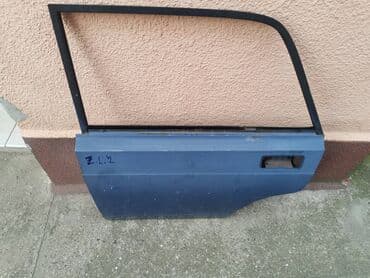 auto delovi velika plana: Vrata zadnja leva Lada 2107 Riva,2105 u plavoj boji ZL2 . Vrata su — 2