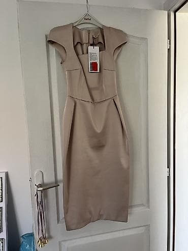 Haljine: Elegantna haljina midi dužine u bež/šampanj nijansi. Model sa kap — 1