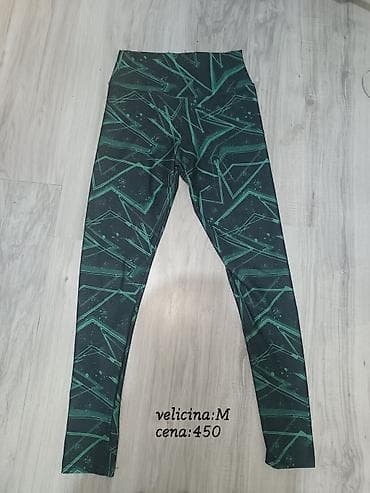 Ženske sportske helanke sa visokim strukom. Crna osnova sa zelenim