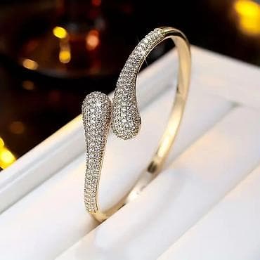 bez ranac: Elegantna ženska narukvica – zlatni ton, otvoreni dizajn sa kapljastim — 2