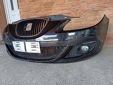 Branici: PREDNJI BRANIK CRNI ZA SEAT LEON OD 2005. DO 2009. GOD. | Prednji — 1