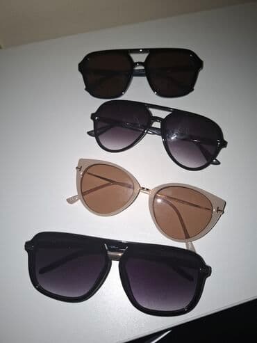 futrola za pasos: Predstavljamo set od četiri para elegantnih unisex naočara za sunce — 1
