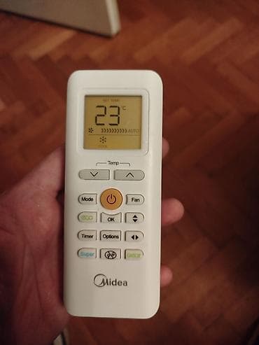 Daljinski za klimu Midea.
Ispravan
