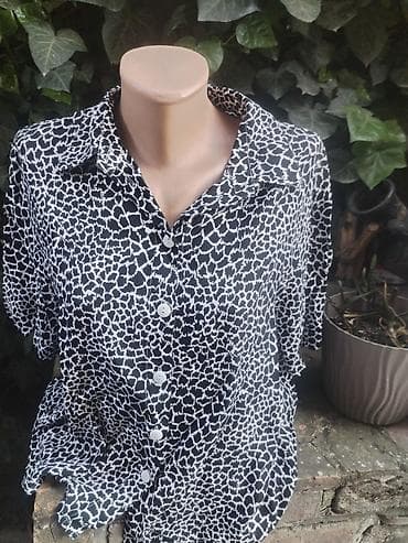 Košulje: Doris kosulja vel L,XL rasprodaja 
Duzina 64
Pazuh po 60 — 3