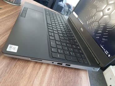 Intel Core i7, 32 GB OZU, 15.6 " — 4