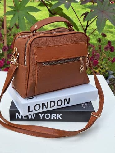 tommy hilfiger d: Prelepi modeli ženskih torbi
Cena 2500 din — 7