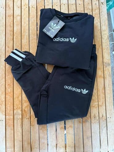 zelene adidas patike: Trenerka uniseks dizajna, dostupna u različitim bojama (zelena, crna — 2
