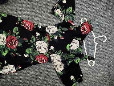 haljine diline: Ženska midi haljina s floralnim printom - Model: kroj u obliku slova — 6