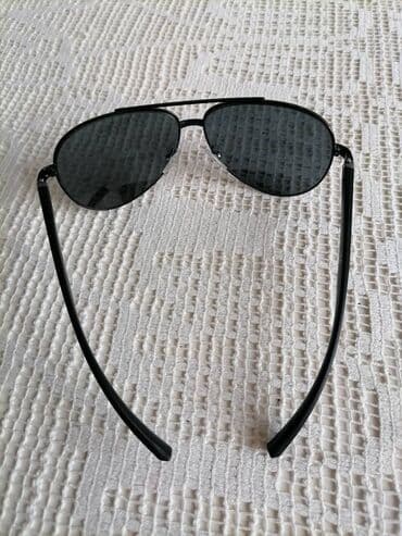 top coat: Sunglasses, Prada — 9