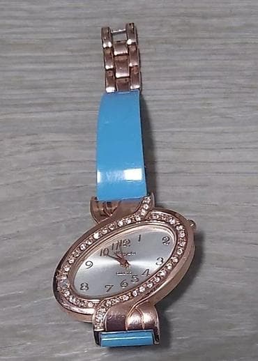 Personal Items: Ženski ručni sat sa elipsastim kućištem u boji roze zlata i ukrasnim — 2