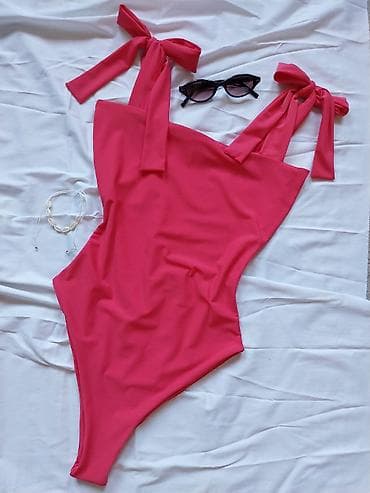 Jednodelni ženski kupaći kostim u živoj pink boji. - Elegantna na lalafo.rs Jednodelni ženski kupaći kostim u živoj pink boji. - Elegantna