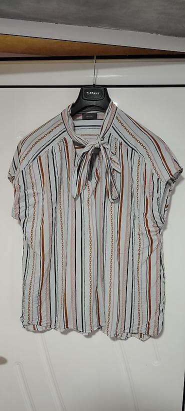 Ženska bluza bez rukava sa mašnom na kragni (brand: Yessica). Lagani