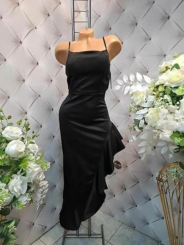 Haljine: Elegantna midi haljina sa asimetričnim volanom - Model: pripijena — 1