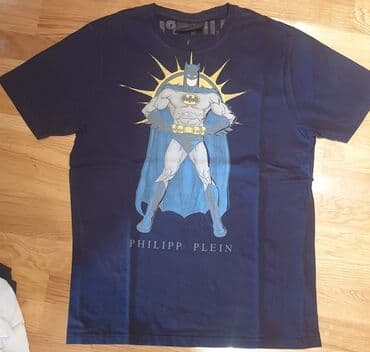 muške zimske jakne c a: PHILIPP PLEIN teget muška majica. Piše xxl velicina,moze i XL. Pazuh — 1