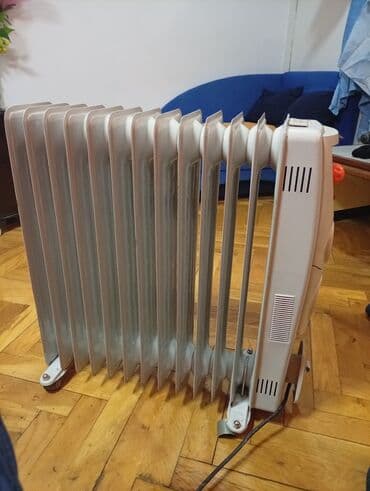 Donji delovi trenerke: Ulje­ni radijator na točkićima - Tip: električni uljni radijator sa — 5