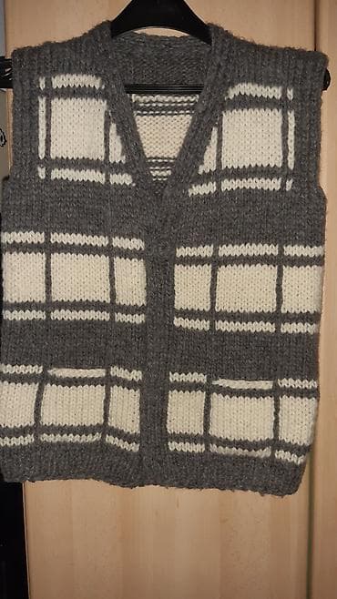 Prsluk vuna. nov. obim grudi 40cm. duzina 55cm