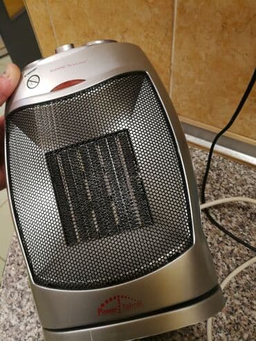 masazer i grejac za noge: Grejalica duvaljka 2 brzine plus ventilator i rotira levo desno sa — 1
