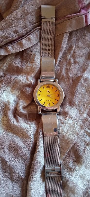 Ostali aksesoari: Calvin Klein sat — 2