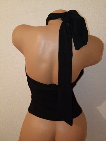 triple s: Kao nova majica, ima elastina.Velicina M — 2