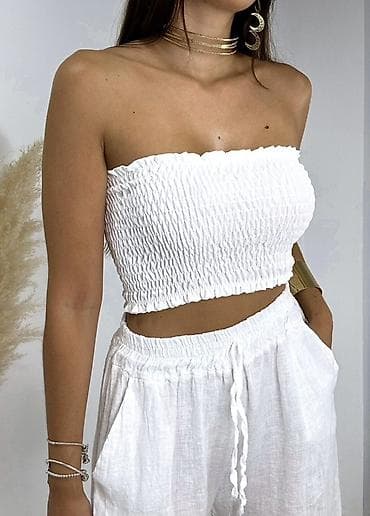 blackpink majica: Ženski top bez naramenica – smock elastični kroj
950 din
S M L — 10