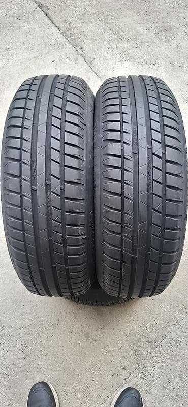 pragovi za auto: Prodajem 2kom polovne letnje auto gume dimenzije 185 65 R15 Riken — 1