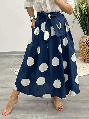 Ženska midi suknja sa velikim tufnama i mašnom - Kroj: A-linija/midi