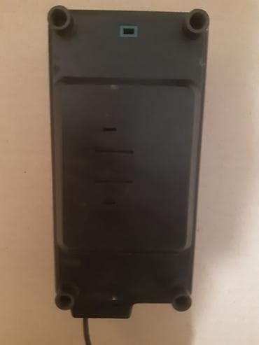 Makita DC 1290 punjač za akumulatore 9,6–12 V, izlaz 1,5 A. -