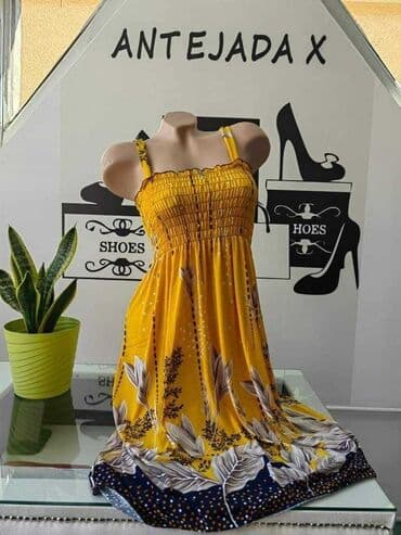 poliester i elastin haljina: Cena 1600 din.
L XL
Poliester — 3