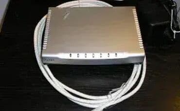 tablet za devojcice: *** SUPER AKCIJA *** #2274 Ruter ZyXEL P-660H-D1; 4-porta; Kao NOVO — 2