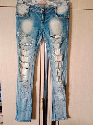 pocepane pantalone: Farmerke jeans svetlo plave iscepane pamuk sa elastinom plitak model — 1