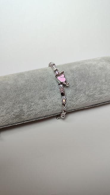 torbe za plazu ps: Nježna narukvica sa privjeskom u obliku srca sa krilima u roze boji — 3