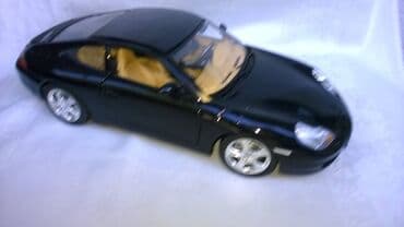 Burago Porsche 911 Carrera,1:18 Italy,fale levi p.i z.zmigavac,naprslo