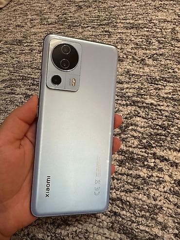 samsung galaxy 1: Xiaomi 13 Lite, 128 GB, color - Light blue, Fingerprint — 2