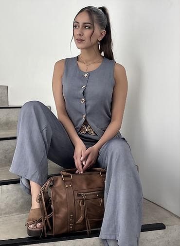 parka s: Ženski komplet prsluk + pantalone, sivo-plavi
3500 din 
S M L — 1