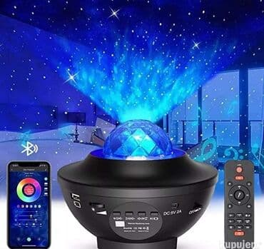 stalak za daljinski: Projektor Zvezdana lampa i bluetooth zvucnik 3300 din Ovaj proizvod — 1