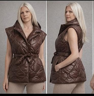 prsluk i kosulja: Ženska prošivena prsluk‑jakna bez rukava u tamno braon boji. Model sa — 1