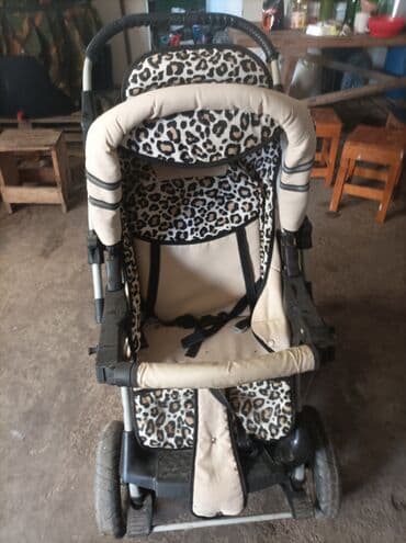 jaknice sa krznom: Dečija kolica marke Lux4kids sa leopard printom. Kolica imaju korpu za — 2