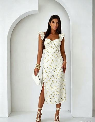 karo haljina: Ženska midi haljina s cvetnim printom
2400 din — 5