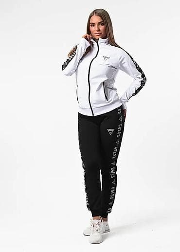 Ženska trenerka Guess – gornji deo i donji deo - Dvodelni set na lalafo.rs Ženska trenerka Guess – gornji deo i donji deo - Dvodelni set