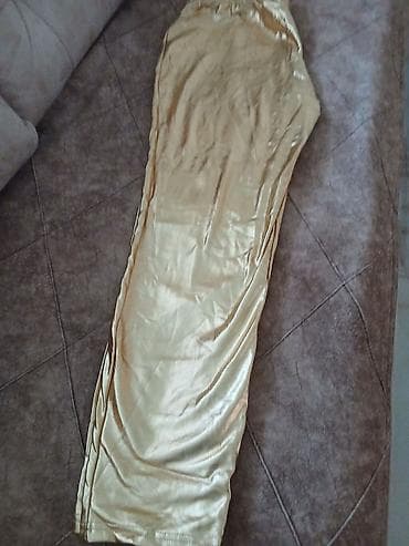 led sat: Zlatne pantalone sa sjajem - Model: duge pantalone ravnog kroja - — 1