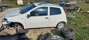 skuter cena: FIAT PUNTO VRATA BELA BOJA | Dobro stanje cena je po komadu — 1