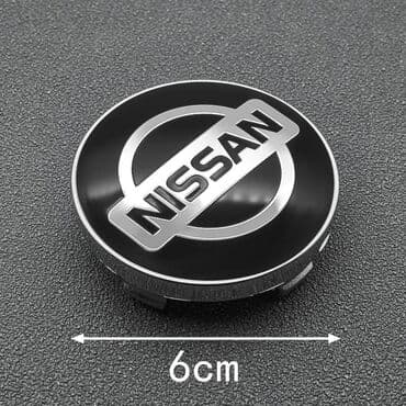 20555 r16 felni: Čepovi za felne NISSAN - set 4 komada Čepovi za felne sa logom NISSAN — 2