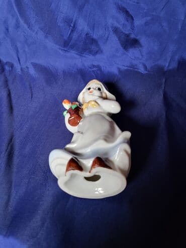 flase sa natpisom: Figura nova,vintaz,holandjanka sa lalama porcelanska. Nova — 12