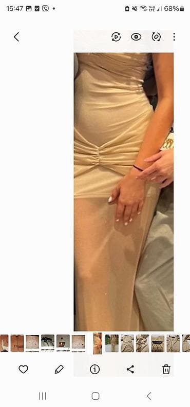 Haljine: Elegantna duga haljina u nijansi šampanj/bele kafe. Model je uski i — 2