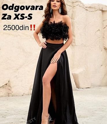 Elegantna dvodelna kombinacija u crnoj boji: - Gornji deo: kratki top na lalafo.rs Elegantna dvodelna kombinacija u crnoj boji: - Gornji deo: kratki top