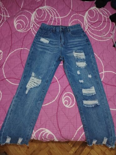 Ženske farmerke sa poderotinama i efektnim izbledelim detaljima. - na lalafo.rs Ženske farmerke sa poderotinama i efektnim izbledelim detaljima. -