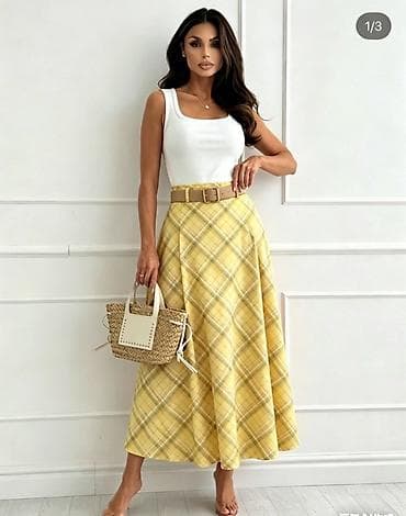 novogodisnje suknje: ✅Ženska midi suknja na A-kroj sa kariranim dezenom
✅2400 din 
S M L — 3